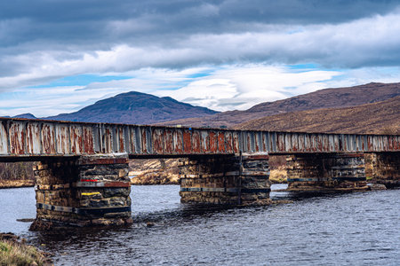 rusty bridge scotland lake river landscape outdoorの写真素材