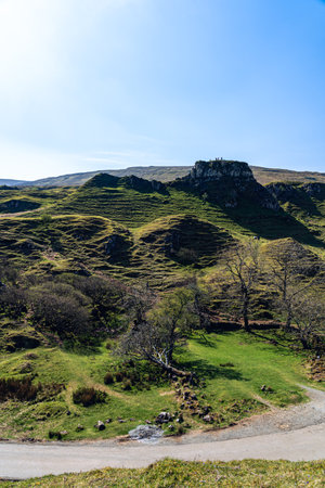 cone-shaped hills of the Fairy Glen, Scotland, UKの写真素材