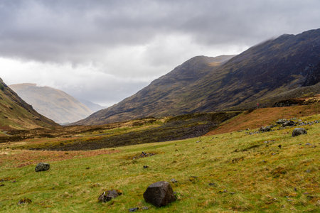 Dramatic sky over snow capped Ben Nevisの写真素材