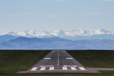 Airport Runway with Mountains in backgroundの写真素材