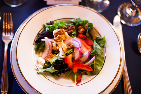 Salad on a dinner tableの写真素材