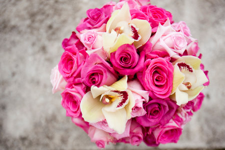 Wedding bouquet of Roses and Cymbidium orchids flowersの写真素材
