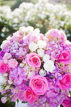 Arrangement of flowers consisting of Pink roses, white spray roses, lisianthus, hydrangeaの写真素材