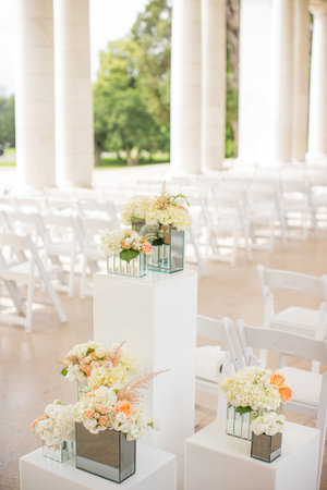 Flowers near the aisle of an elegant wedding ceremonyの写真素材