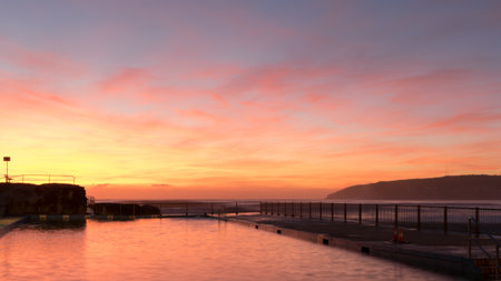 Sunrise over the Queenscliff Ocean Pool on Manly Beach, Sydneyの写真素材