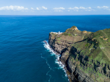 Aerial view of Bitoujiao lighthouse, a famous scenery of Taiwan northeast corner. Birds eye view in Bitoujiao cape, Ruifang district, New Taipei, Taiwan.の写真素材