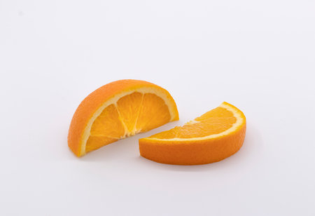 Orange Fruit Slice On Whiteの写真素材