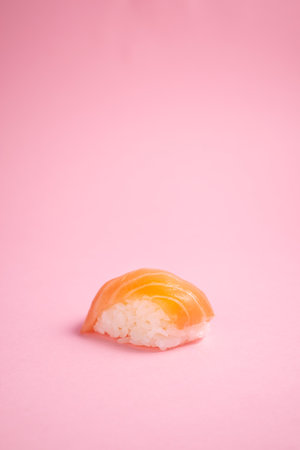 Sushi salmon on pink backgroundの写真素材
