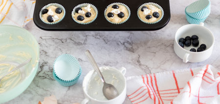 Prepared but unbaked blueberry muffins.