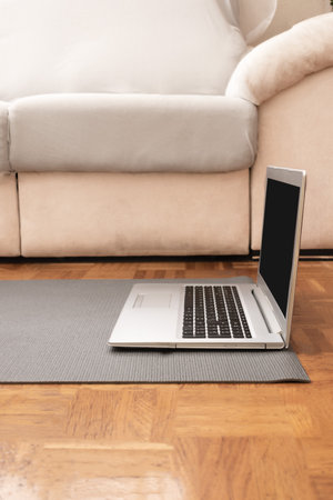 Laptop on yoga mat.の写真素材