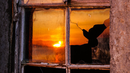 A shattered glass reflecting the sunset in Scotland.