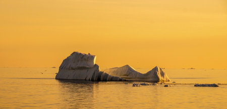 Iceberg in Greenland during sunset.の写真素材