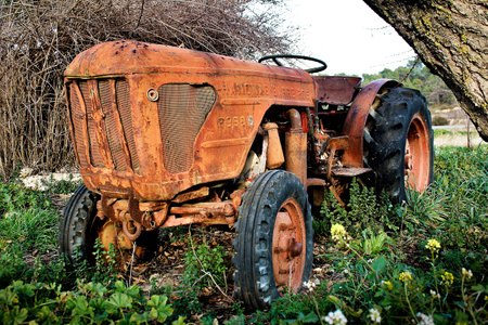 old and rust farm tractor machine abandonedの写真素材