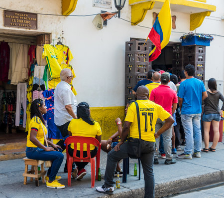 Cartagena, Colombia. April 2018. A view of peopl watching a colombia soccer game in a bar in Cartagena, Colombia.のeditorial素材