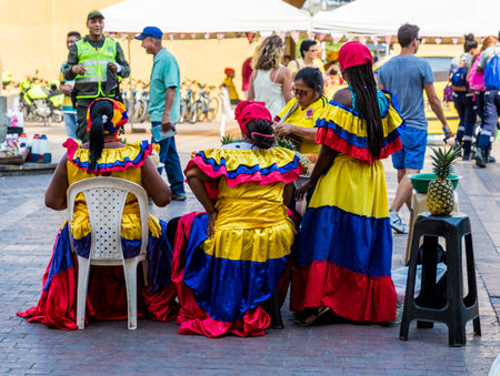 Cartagena, Colombia. April 2018. A view of typically dressed colombian women in Cartagena, Colombia.のeditorial素材