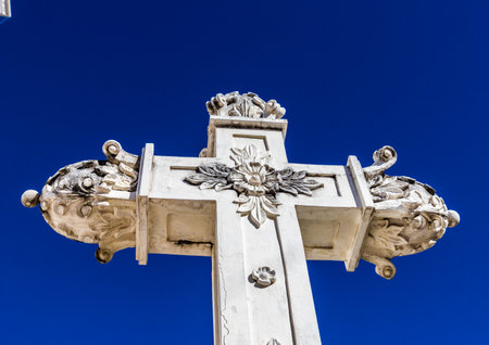 A view of the crucifix above the cathedral of santa Ana in Santa Ana El Salvador.の写真素材