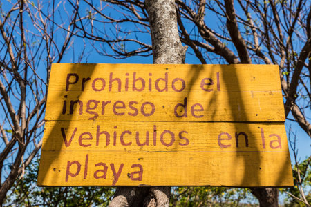 Ometepe, Nicaragua. February 2018. A view of a sign saying cars are not allowed on the beach  on ometepe island in Nicaragua.のeditorial素材