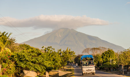 Ometepe, Nicaragua. February 2018. A view of a bus with the Volcano Concepcion behind it on ometepe island in Nicaragua.のeditorial素材