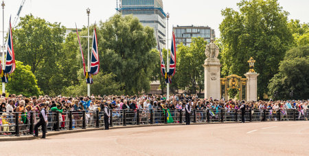 London. June 9 2018. A view of some of the crpwds at the during the Queens birthday celebrations of Trooping the Colourのeditorial素材