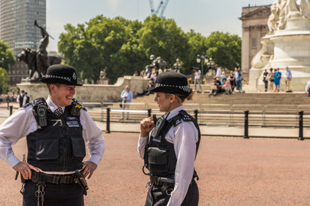 London. June 9 2018. A view of 2 female police officers during the Queens birthday celebrations of...