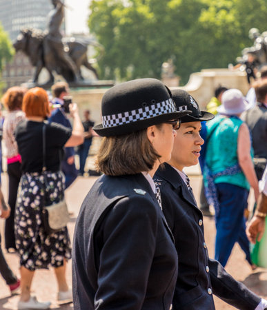 London. June 9 2018. A view of 2 female police officers during the Queens birthday celebrations of Trooping the Colourのeditorial素材