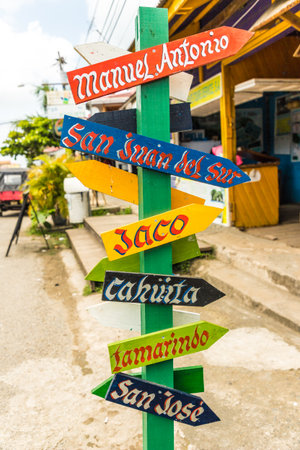 Bocas del toro Panama. March 2018. A view of a wooden sign pointing to various towns in Panama, on...