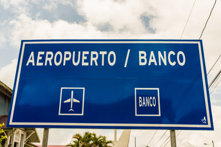 Bocas del toro Panama. March 2018. A view of a sign stating airpot and bank in spanish on the island of Bocas del toro in Panama.のeditorial素材