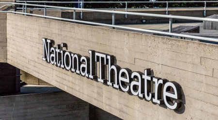 London. June 2018. A view of the sign for the national theatre along the south bank in Londonのeditorial素材