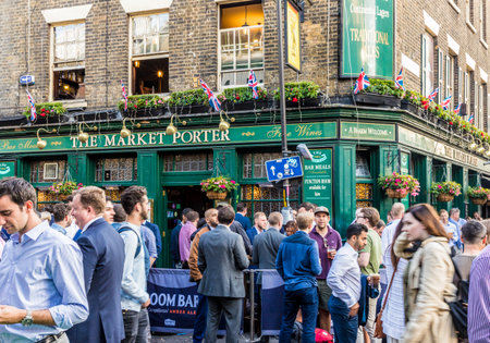 London. June 2018. A view of people enjoying an after work drink in the market porter pub in London.