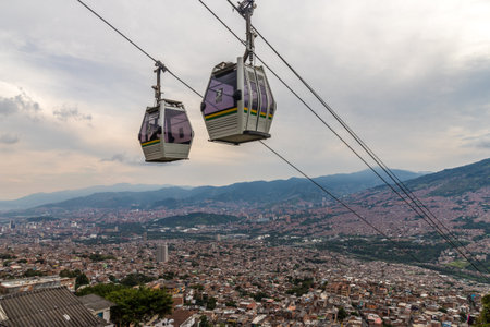 Medellin, Colombia. April 2018. A view of the mass transport system cable cars over Medellin in Colombia.のeditorial素材