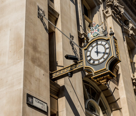 London. May 2018. A view of one of the old clocks on the royal exchange in the City of london in London.のeditorial素材