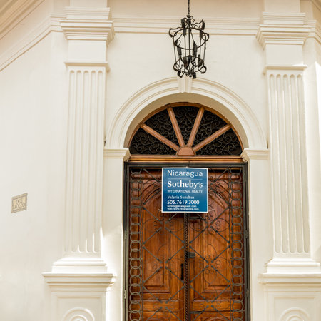 Leon, Nicaragua. February 2018. A view of a Sothebys for sale sign in Leon Nicaraguaのeditorial素材