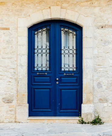 A typical view of an old building with old doors in the traditional village Omodos in Cyprus.