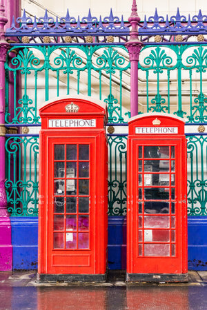 London. June 2018. A view of colourful phone boxes in smithfield market in London