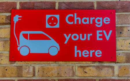 London. August 2018. A view of an electric vehicle charging sign in Londonのeditorial素材
