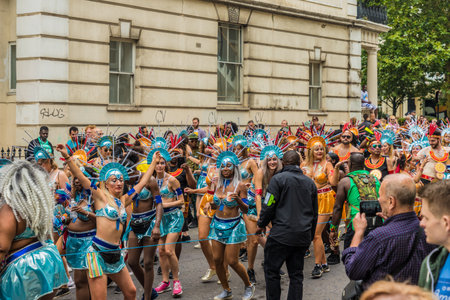 London. August 27 2018. Colourful participants during the Grand Parade, Notting Hill Carnival, in...
