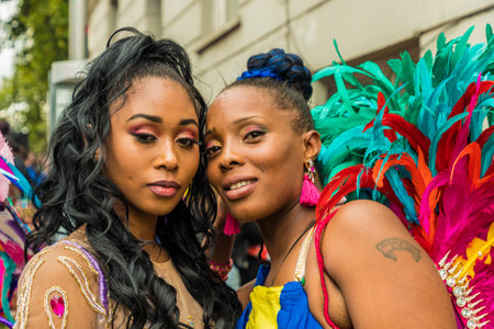 London. August 27 2018. A Colourfully dressed participant during the Grand Parade, Notting Hill Carnival, in London.のeditorial素材