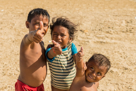 Cabo de la vela, La Guajira, Colombia. April 2018. A view local childrenon the beach in Cabo de la Vela in Colombiaのeditorial素材