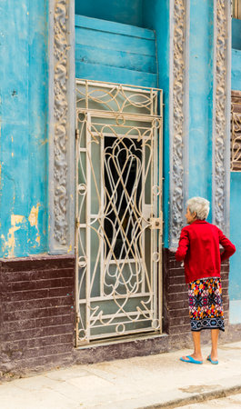 Havana Cuba. january 2018. A view of a local lady and typical aged architecture in Havana in Cubaのeditorial素材