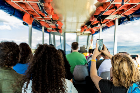 La Fortuna, Costa Rica. March 2018. A view of tourists on a boat on lake Arenalof in Costa Rica