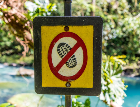 La Fortuna, Costa Rica. March 2018. A view of a wooden sign in Rio Celeste waterfall in Costa Ricaのeditorial素材