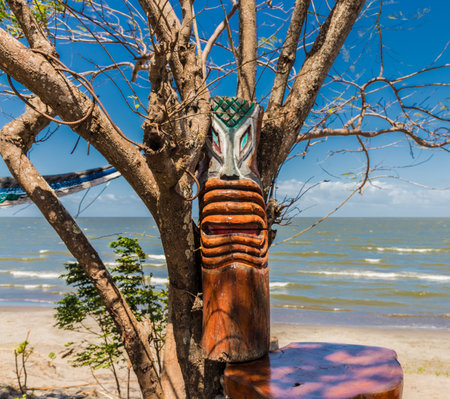 Ometepe Nicaragua. February 2018. A typical view of wooden art on the beach on Ometepe Island in Nicaraguaのeditorial素材