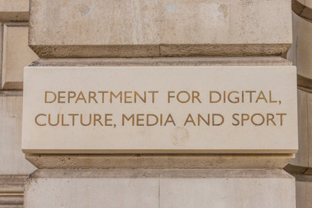 London October 2018. A view of a sign for Digital culture, media and sport outside its office in Londonのeditorial素材