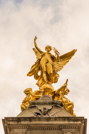 London. November 2018. A view of the golden winged statue on the Queeen Victoria memorial at Buckingham Palace in London.のeditorial素材