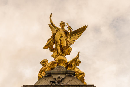 London. November 2018. A view of the golden winged statue on the Queeen Victoria memorial at Buckingham Palace in London.のeditorial素材