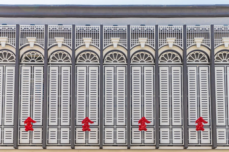 January 2019. Phuket Town Thaialnd. A view of traditional shuttered windows in Phuket Town Thailandのeditorial素材