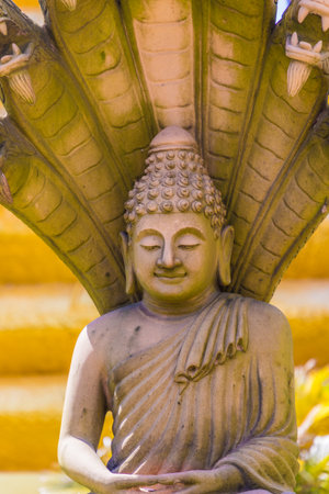 A golden buddha at the Big Buddha statue in Phucket Thailandの写真素材