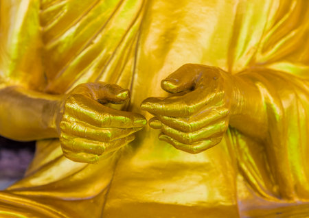 A golden buddha at the Big Buddha statue in Phucket Thailand