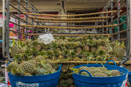 January 2019. Phuket Town Thaialnd. Pineapples for sale at the 24 hour local market in Phuket Town Thailandのeditorial素材
