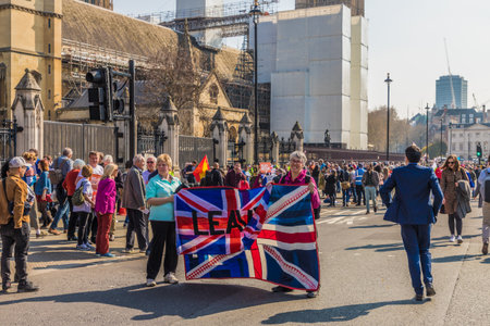Friday March 29 2019. London. Uk. A scene at he march to leave the EU by Brexit supporters at parliament Square in Westminster.のeditorial素材